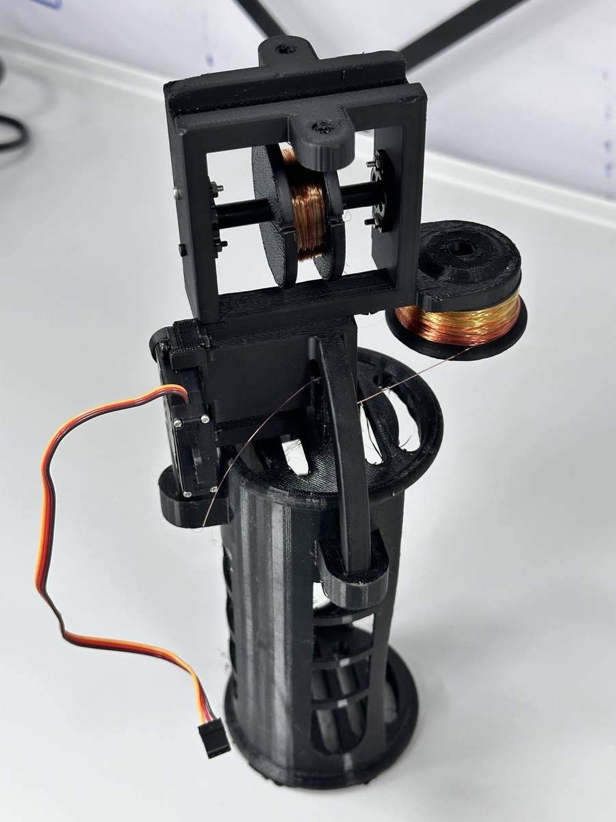 Assembled two-stage payload drop mechanism used in drop testing